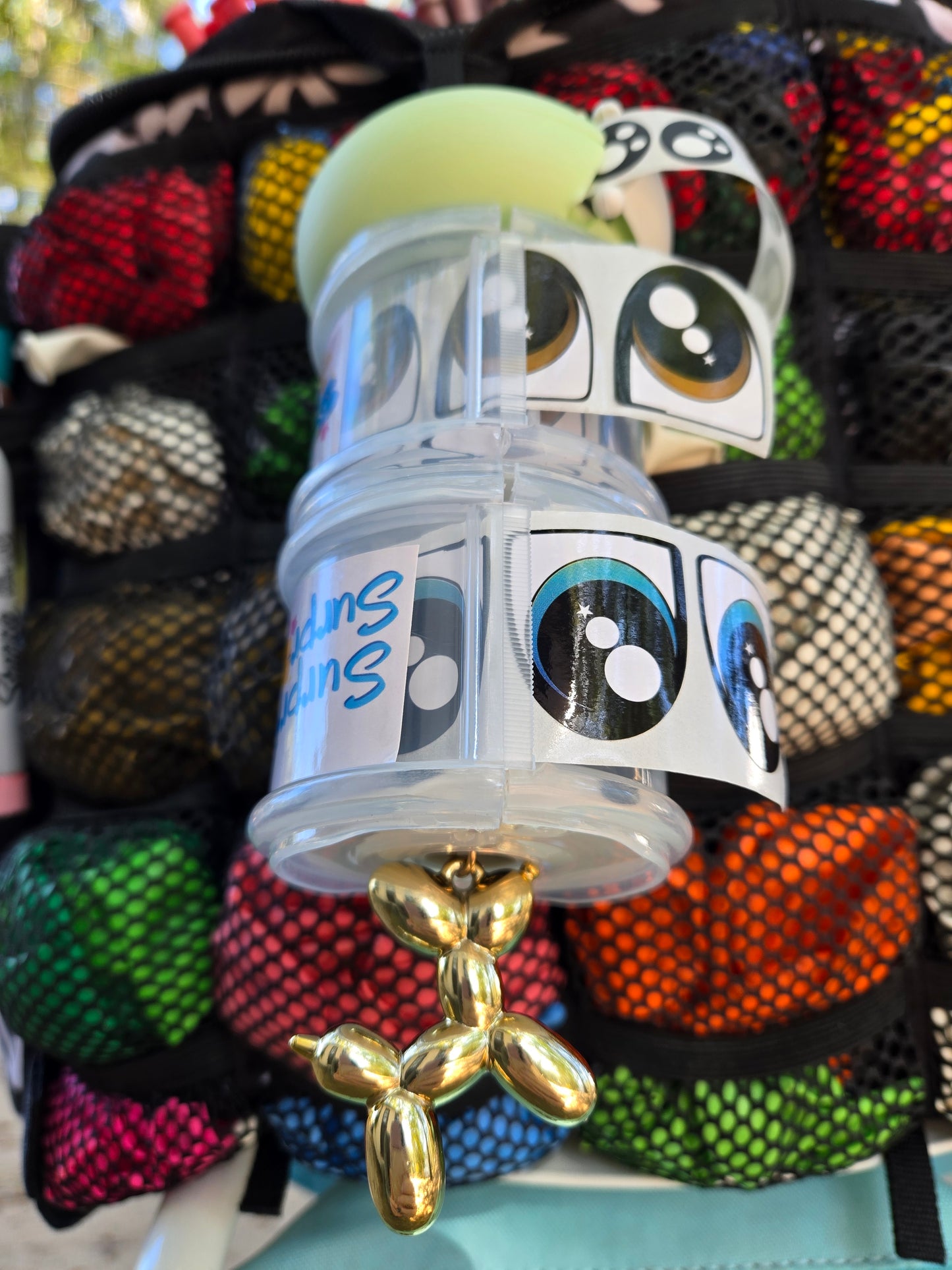 Balloon dog sticker dispenser holder